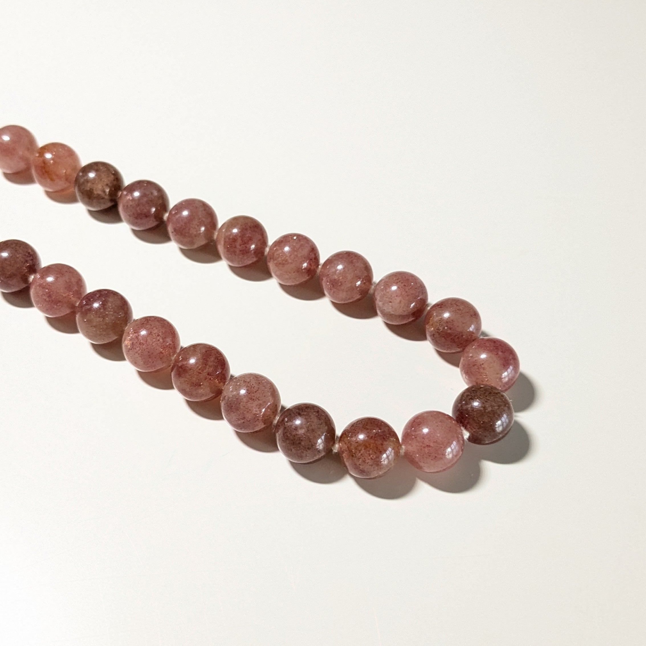 Knotted Strawberry Quartz Energy Necklace